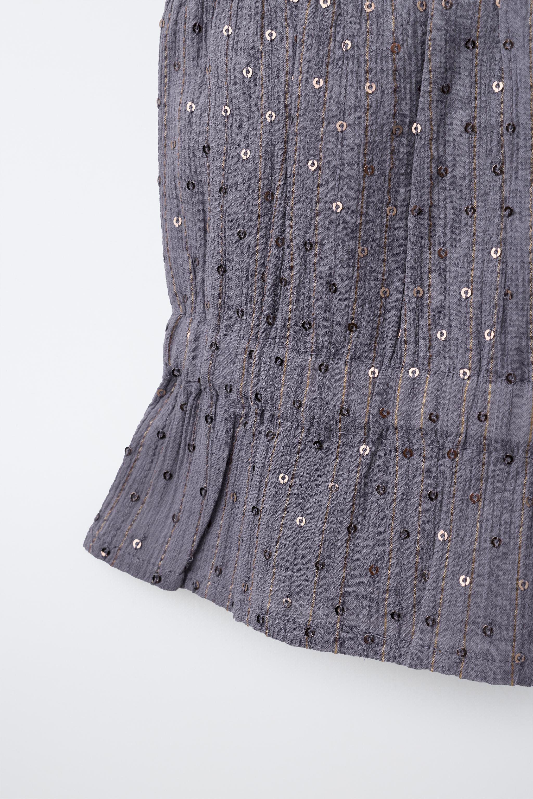 TOP À PAILLETTES
